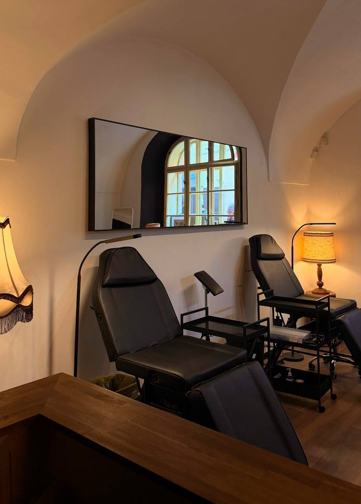 STIN tattoostudio interior — Gothic vaulted ceiling, Prague